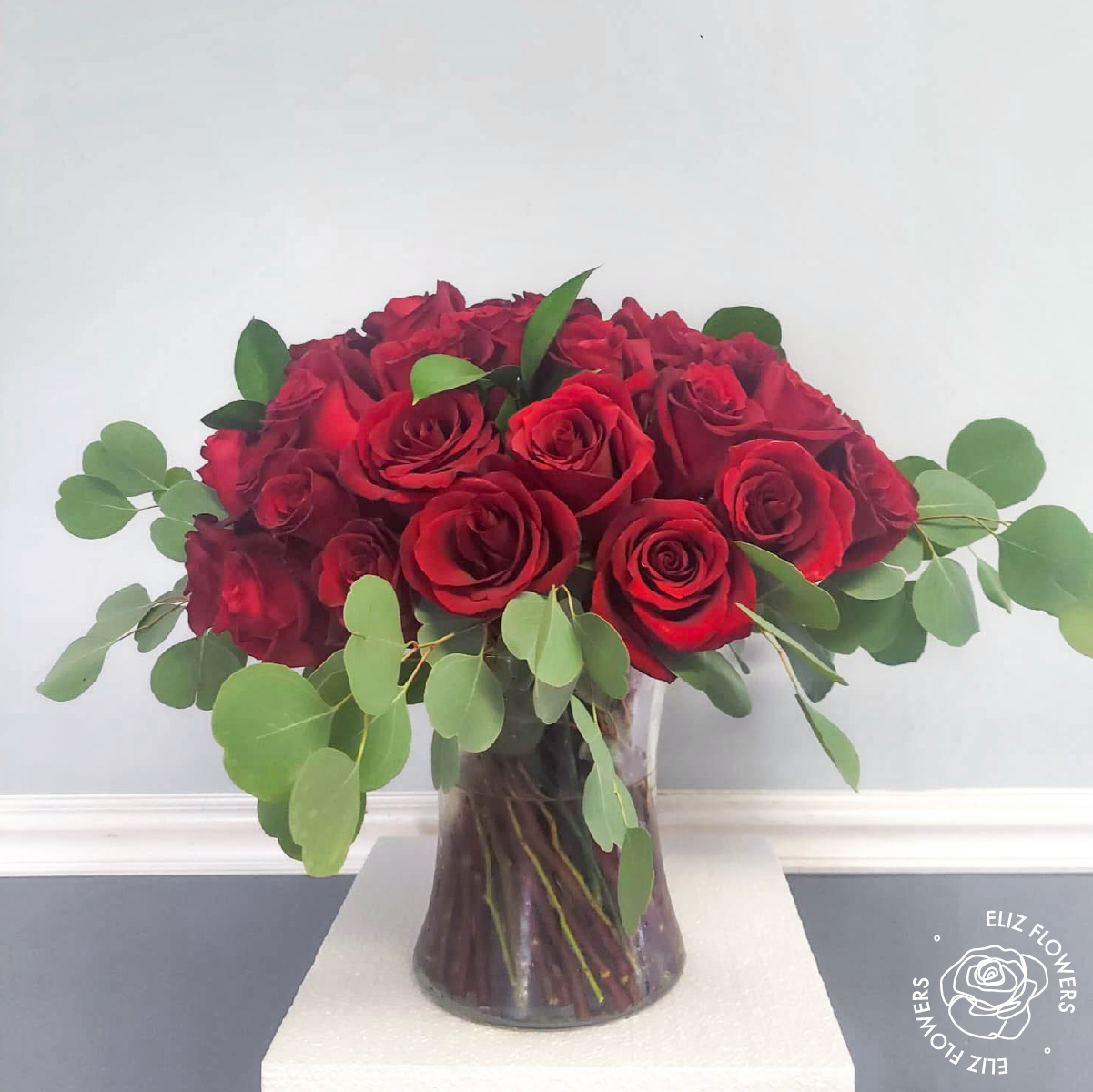 Classic Roses in a Glass Vase